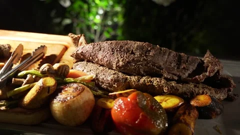 Grilled Beef Tenderloin with Roasted Vegetables on Outdoor Gourmet Barbecue Stock Footage 337603186
