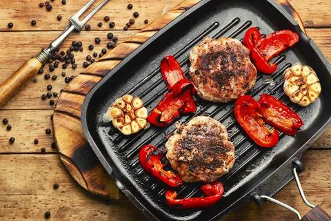 Grilled beefsteak in bacon Stock Photos