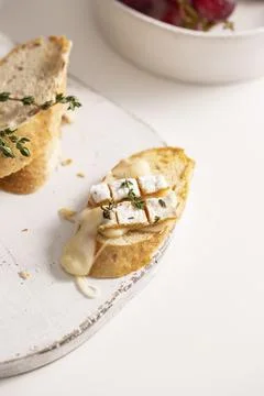 Grilled bread with brie cheese Stock Photos