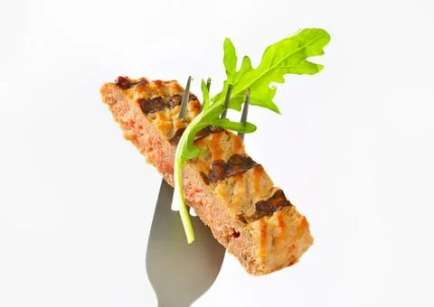 Grilled bread with herbs on fork Stock Photos