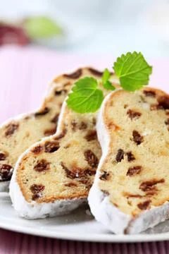 Grilled bread slices with mint garnish on plate 스톡 사진