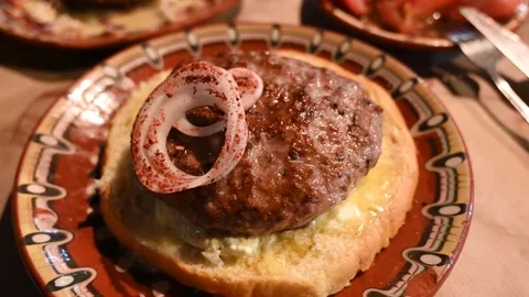 Grilled burger served in restaurant. Roasted minced meat. Stock Footage 283687580
