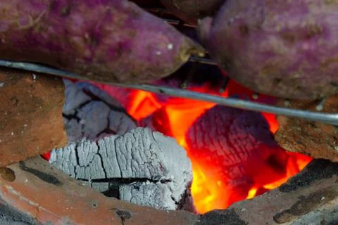 Grilled cassava with charcoal Stock Photos