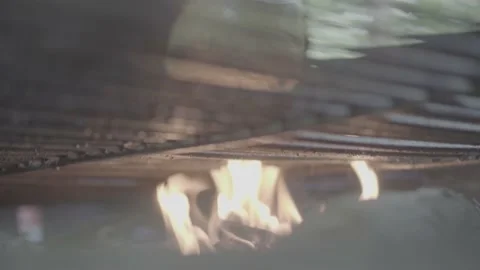 Grilled cheese with flames, seen from below Stock Footage 218599180