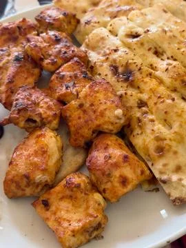 Grilled Chicken and Flatbread Platter Stock Photos