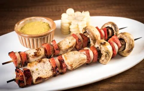 Grilled Chicken and Vegetable Skewers with bell peppers, zucchini, onion and  Stock Photos