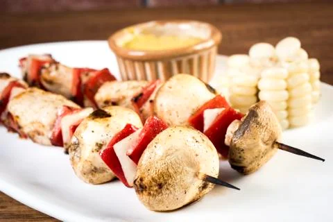 Grilled Chicken and Vegetable Skewers with bell peppers, zucchini, onion and  Stock Photos