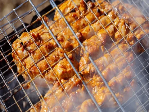 Grilled chicken, grilled meat turn over on the grill Stock Footage 74065891