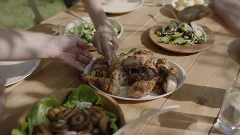 Grilled Chicken Legs Dish Chef Putting on Table Video stock 145248945