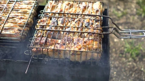 Grilled chicken legs Stock Footage 75634873