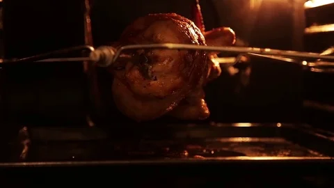 Grilled chicken in the oven on a spit Stock Footage 80923089