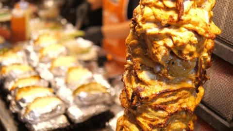 Grilled Chicken Shawarma Rotating on Spit at Street Food. Stock Footage 322007181