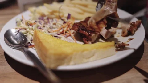 Grilled chicken steak served on a white plate with crispy french fries, fre.. Stock Footage 344029679