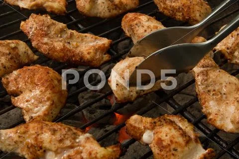 Grilled Chicken Tenders On A Charcoal Grill Stock Photos