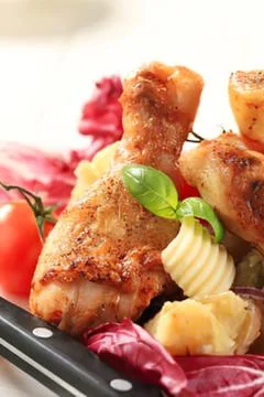 Grilled chicken thighs with mashed potatoes and veggies Stock Photos