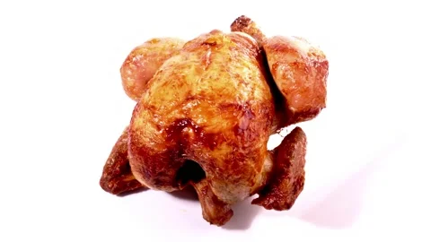 Grilled Chicken on a turntable isolated on white background Stock Footage 189336533