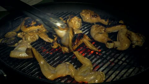 Grilled chicken wings on the grill. Preparing chicken wings on the grill. Stock Footage 159288268