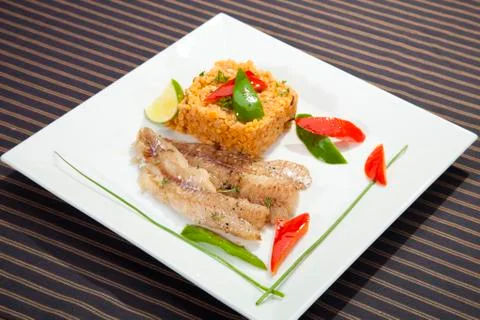 Grilled codfish with red lentil Stock Photos