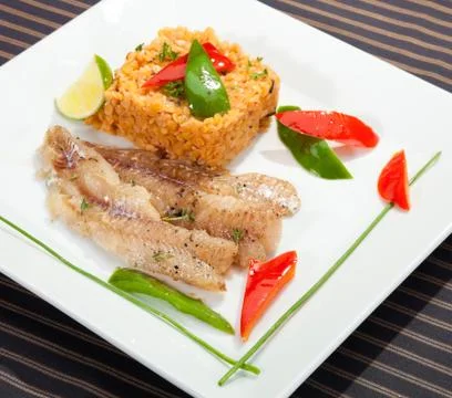 Grilled codfish with red lentil Stock Photos