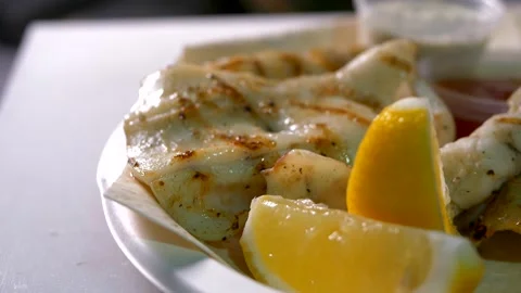 Grilled Colmar with lemon and various mousses on white plate. Stock Footage 154267951