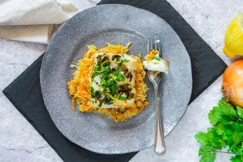 Grilled coriander and lemon cod Stock Photos