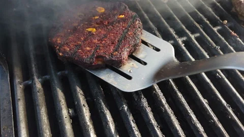 Grilled corn patty or flat cake on a BBQ grill Stock Footage 157352872