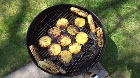 Grilled Corn &amp; Pineapple on the Grill on my backyard. Sliced juicy pineapple. Stock Footage 74765588