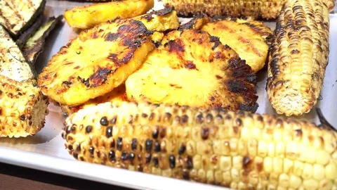 Grilled Corn &amp; Pineapple from the Grill ready for eating Stock Footage 74756749