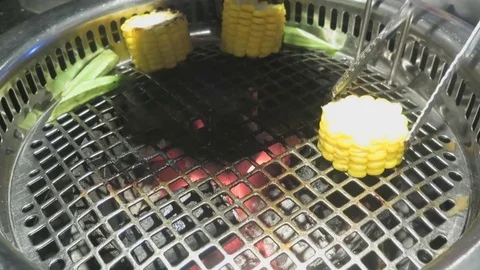 Grilled corn on the stove Stock Footage 70543447