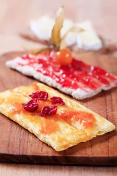 Grilled crackers with tomato jam and berries Stock Photos