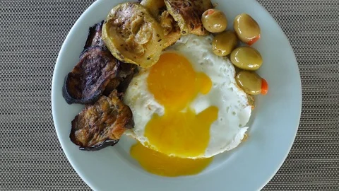 Grilled eggs and vegetables cooked on the grill as a delicious and healthy br Stock Footage 120908607