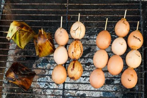 Grilled eggs in stick. Stock Photos