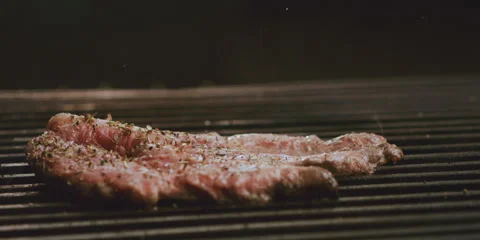 Grilled fillet steak in flames Video stock 247385524