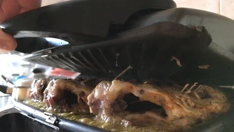 Grilled fish at home Video stock 105923898