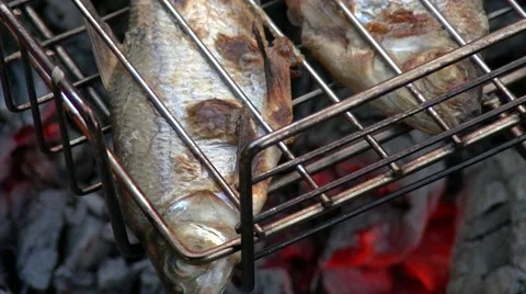 Grilled fish. Roaches. End of cooking. Close up. Stock Footage 51003247