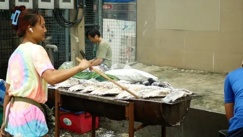 Grilled fish Thai salt crusted, Nile Tilapia Oreochromis niloticus fish seafood Stock Footage 341877306