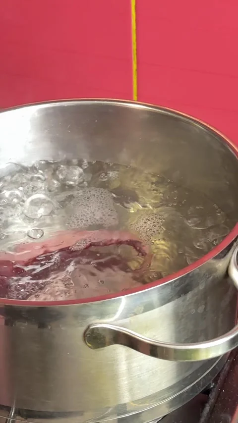 Grilled giant squid tentacles served with lemon and herbs as a gourmet seafood Stock Footage 345742522