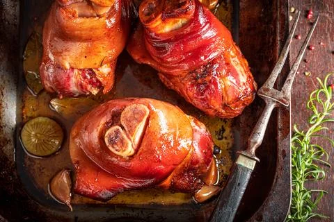 Grilled ham hock as regional dish in Bavaria. Stock Photos