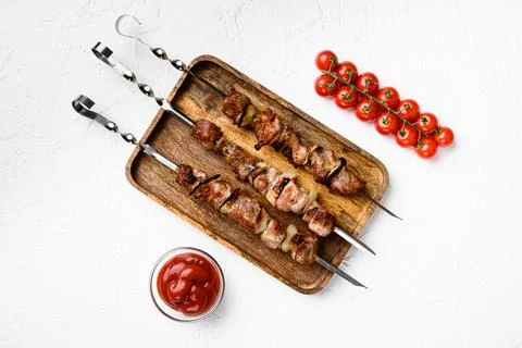 Grilled kebab, on white stone table background, top view flat lay, with copy  Stock Photos
