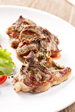 Grilled lamb chops with mixed salad. High quality photo Stock Photos