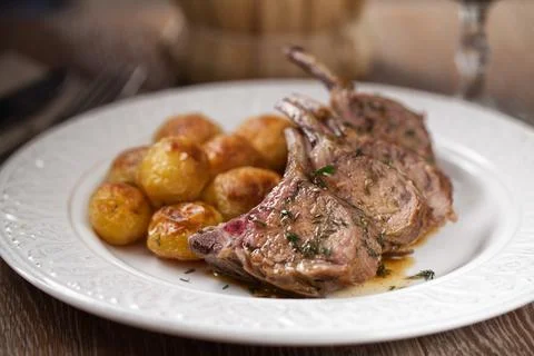 Grilled lamb chops with potatoes. High quality photo. Stock Photos
