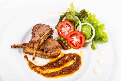 Grilled lamb chops  with vegetables Stock Photos
