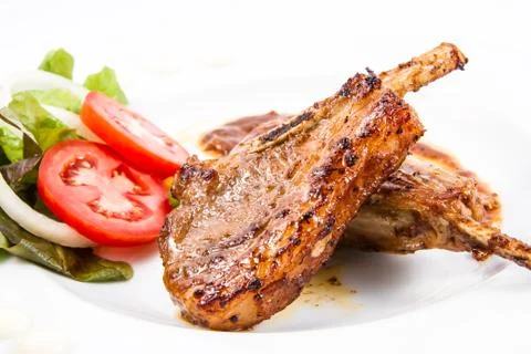 Grilled lamb chops  with vegetables Foto stock