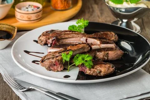 Grilled lamb ribs with sauce Stock Photos