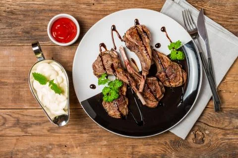 Grilled lamb ribs with sauce Stock Photos