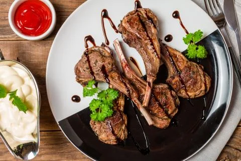 Grilled lamb ribs with sauce Stock Photos