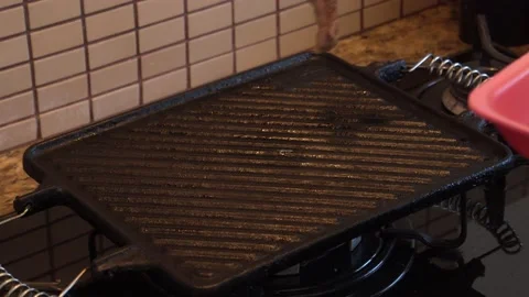 Grilled meat on the barbecue Stock Footage 130267444