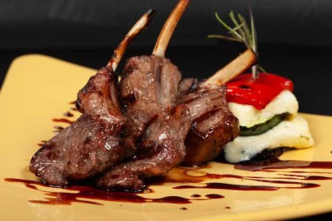 Grilled meat with a bone Stock Photos