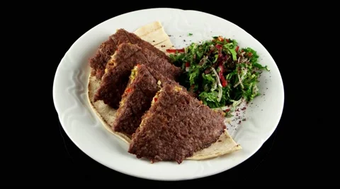 Grilled meat cutlets stuffed with cheese and pistachios, loop, top view Stock Footage 61709279