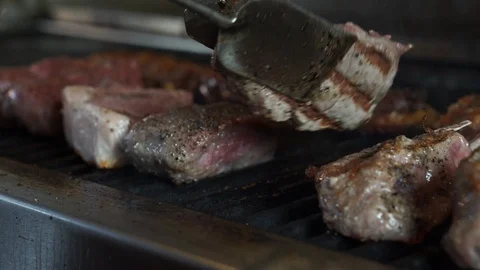 Grilled Meat Flipped on Grill Video stock 92616031